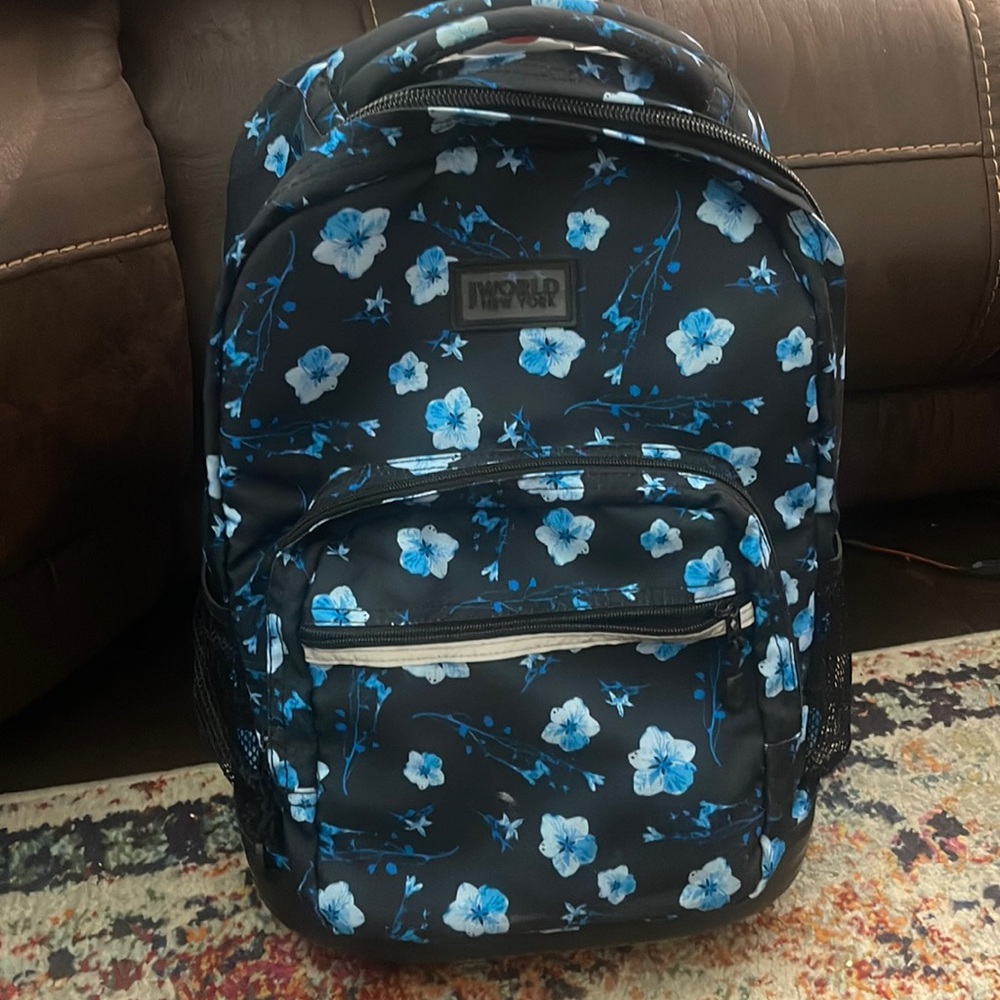 Floral rolling backpack